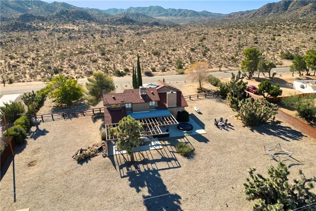 a front view of a houses on the roadside
