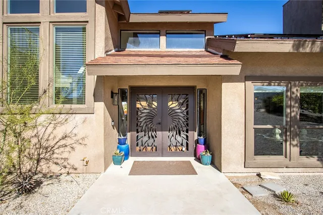 a living room with fireplace furniture and a fireplace