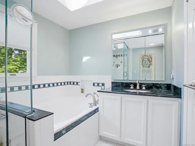 a view of a swimming pool with a house