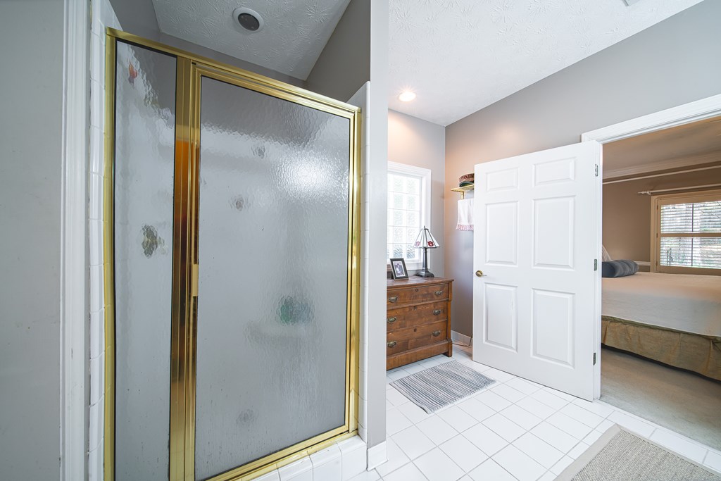 4607 Baltusrol Court Columbus, GA 31909 - Photo 16 of 35 a bathroom with a shower and a sink