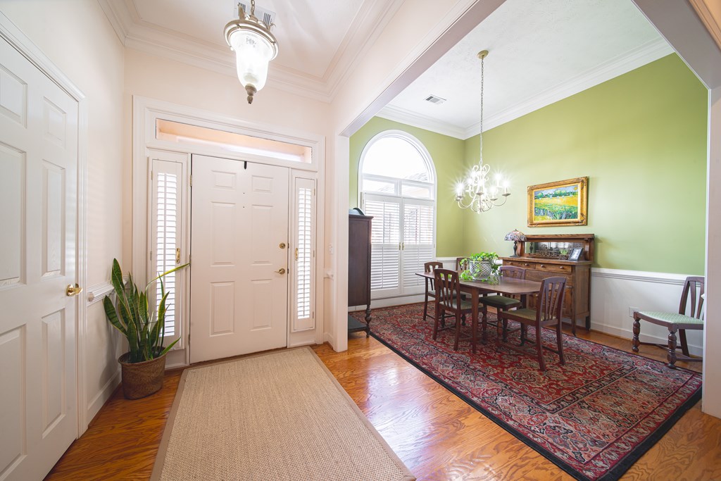 4607 Baltusrol Court Columbus, GA 31909 - Photo 2 of 35 a view of a livingroom with furniture window and wooden floor