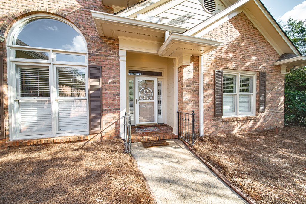 4607 Baltusrol Court Columbus, GA 31909 - Photo 34 of 35 a view of a brick house with a large windows
