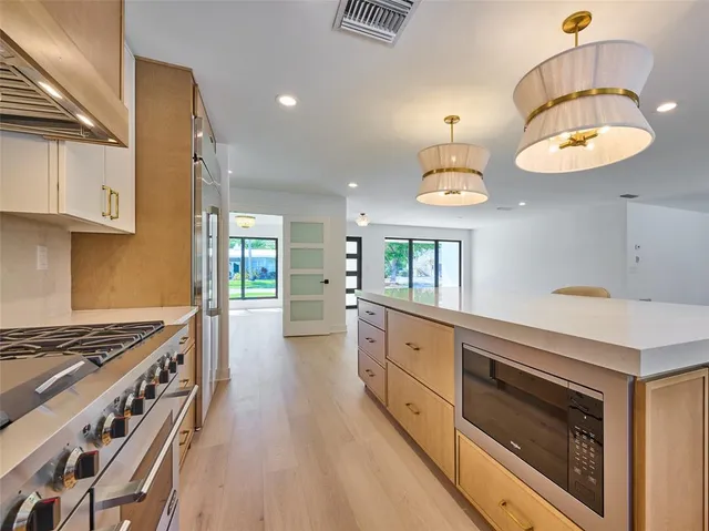 a view of a room that has a window