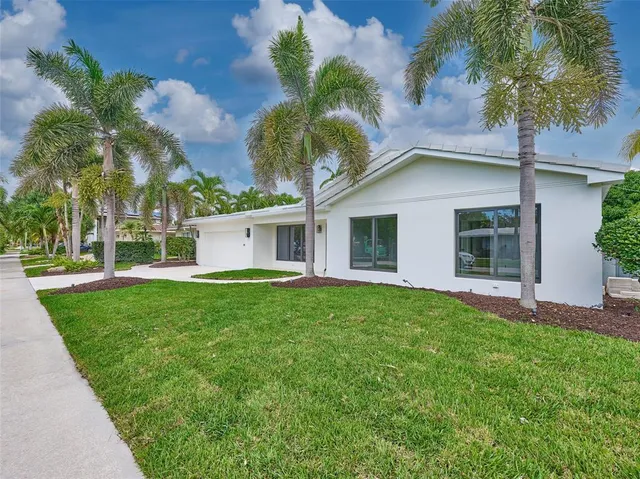 a house with yard in front of it