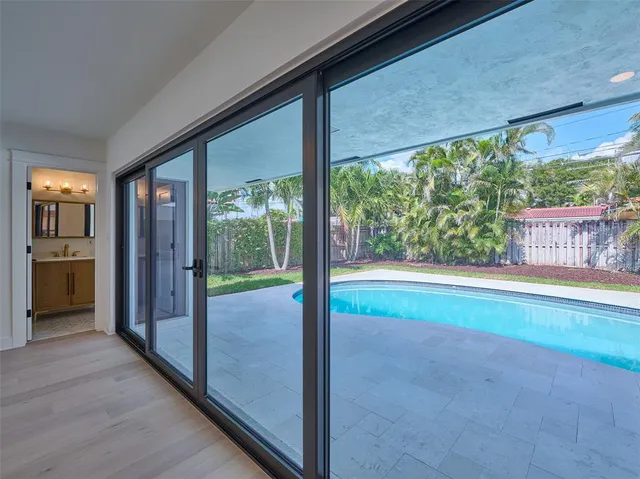 a view of backyard with green space