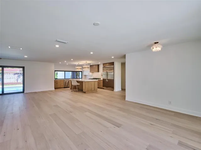 wooden floor and windows in an empty room