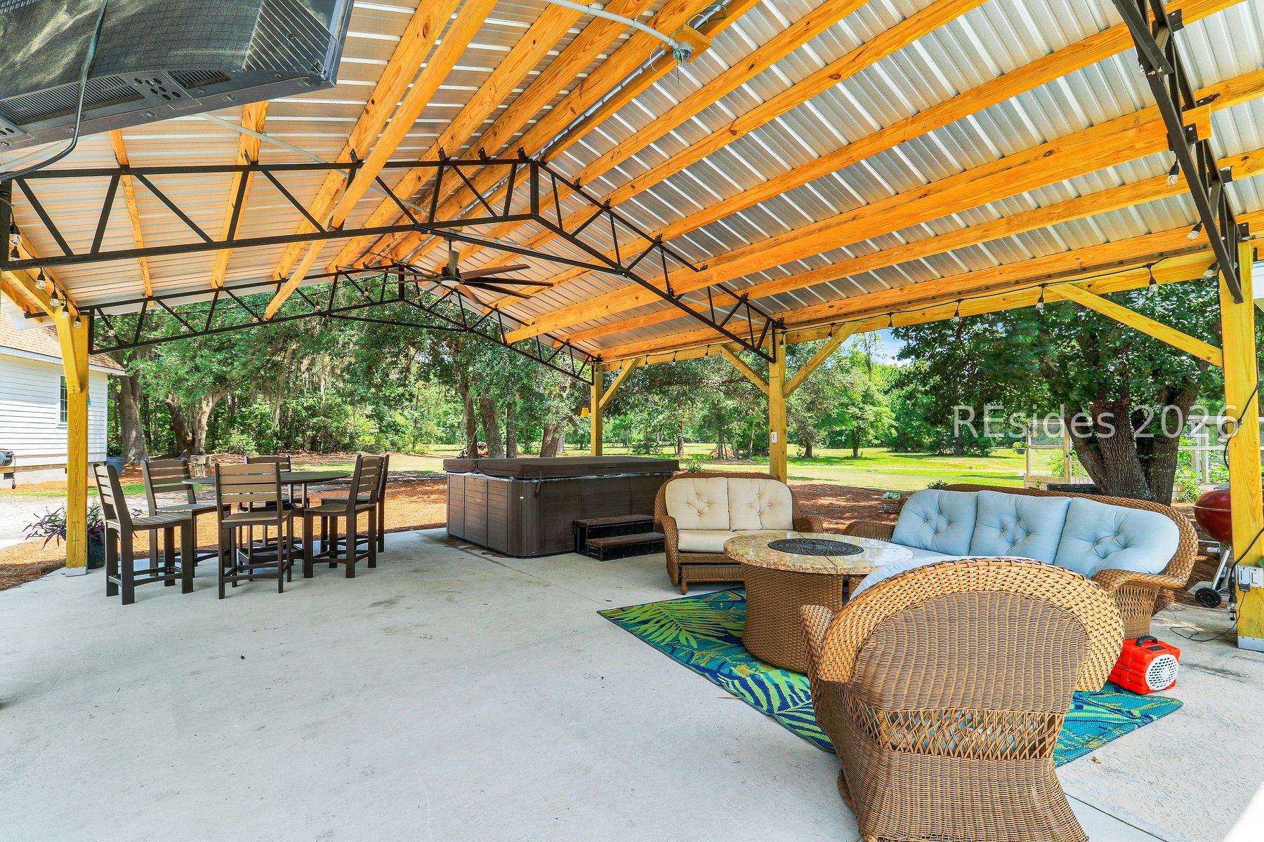 7724 Bees Creek Road Ridgeland, SC 29936 - Photo 59 of 82 New Covered Sitting area by pool with Tv/Firepit