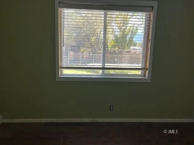 a kitchen with granite countertop a sink and a stove