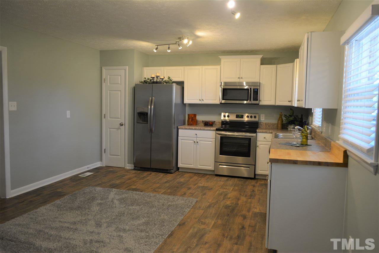 Newer cabinets, new lighting, new blinds