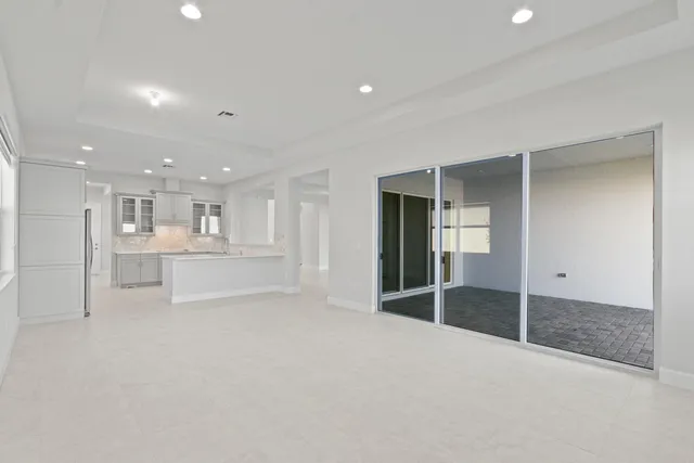 a bathroom with a double vanity sink mirror and shower