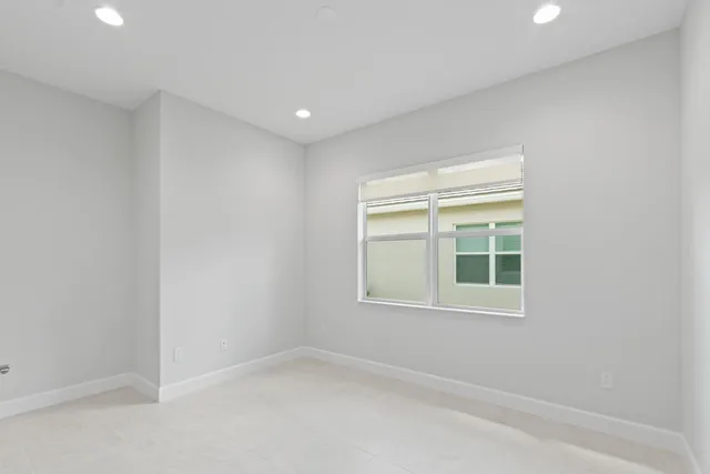 a view of swimming pool with a open kitchen view