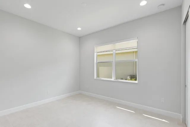 an aerial view of a house with a garden