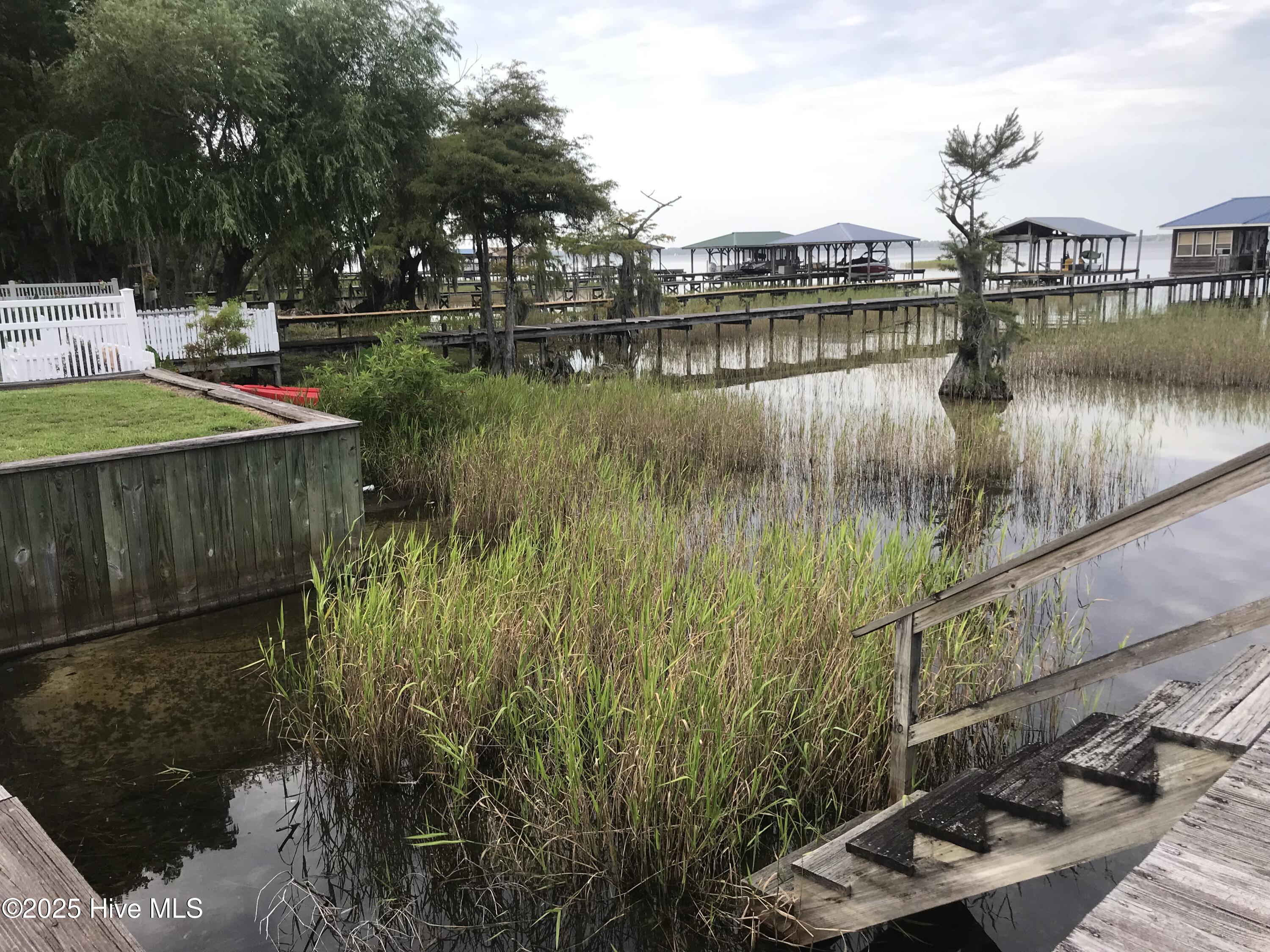 3935 Waccamaw Shores Road Lake Waccamaw, NC 28450 - Photo 2 of 8 lake front bulkhead