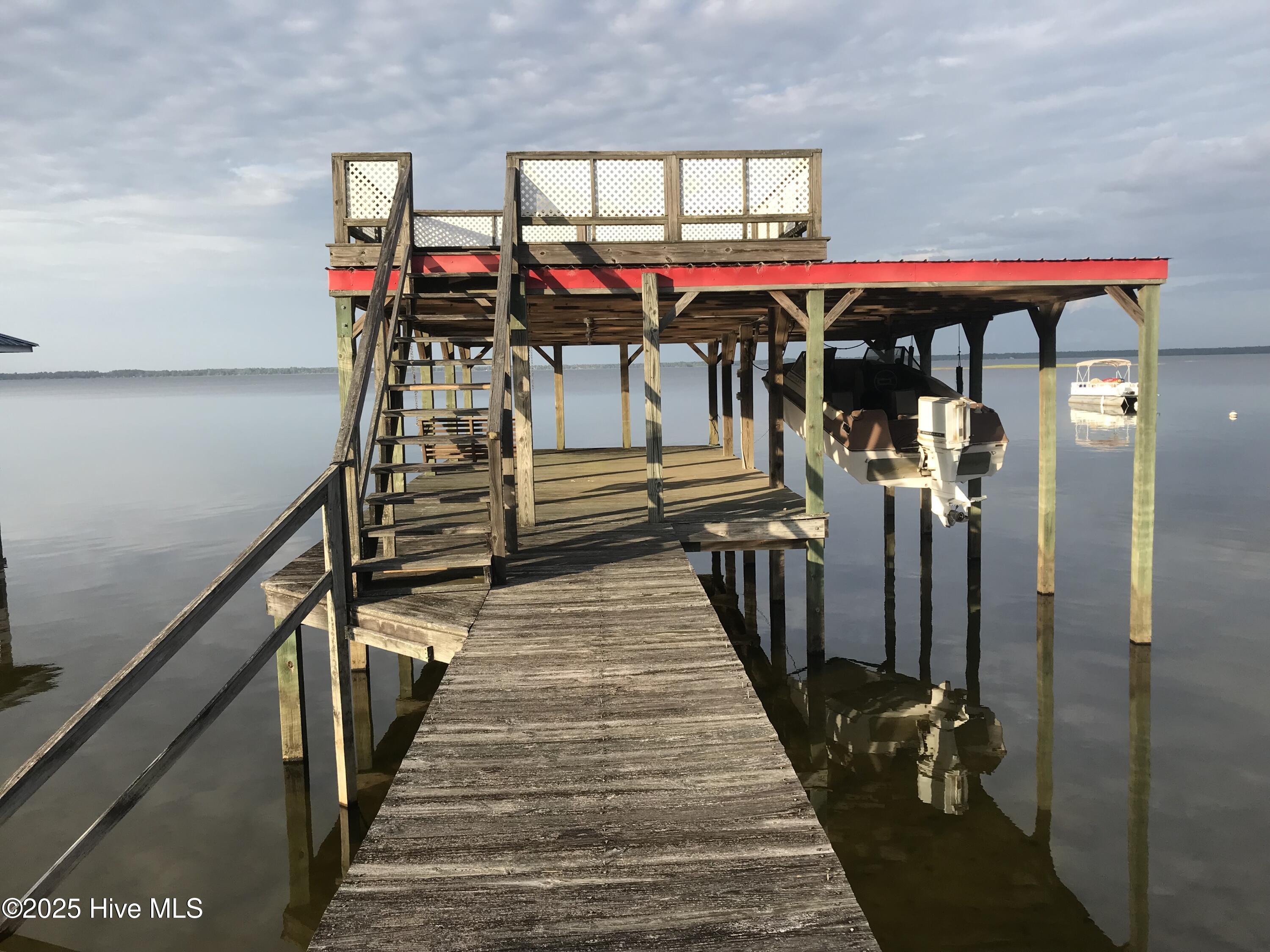 3935 Waccamaw Shores Road Lake Waccamaw, NC 28450 - Photo 7 of 8 lake pier 4