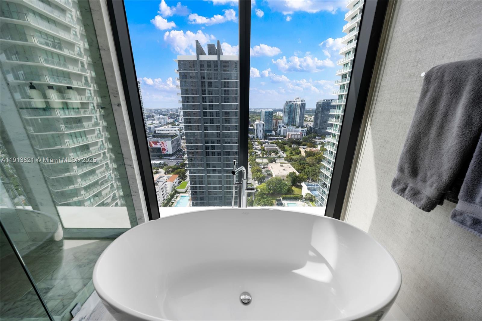 480 Northeast 31st Street, Unit 2807 Miami, FL 33137 - Photo 30 of 45 a large window with outside view