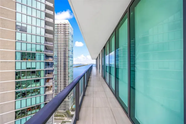 a view of a balcony with city view