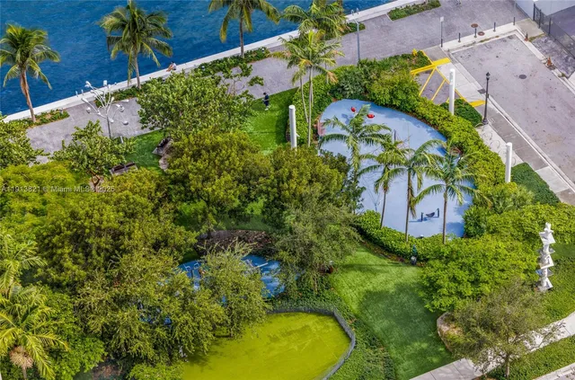 a view of a city with tall buildings in the background