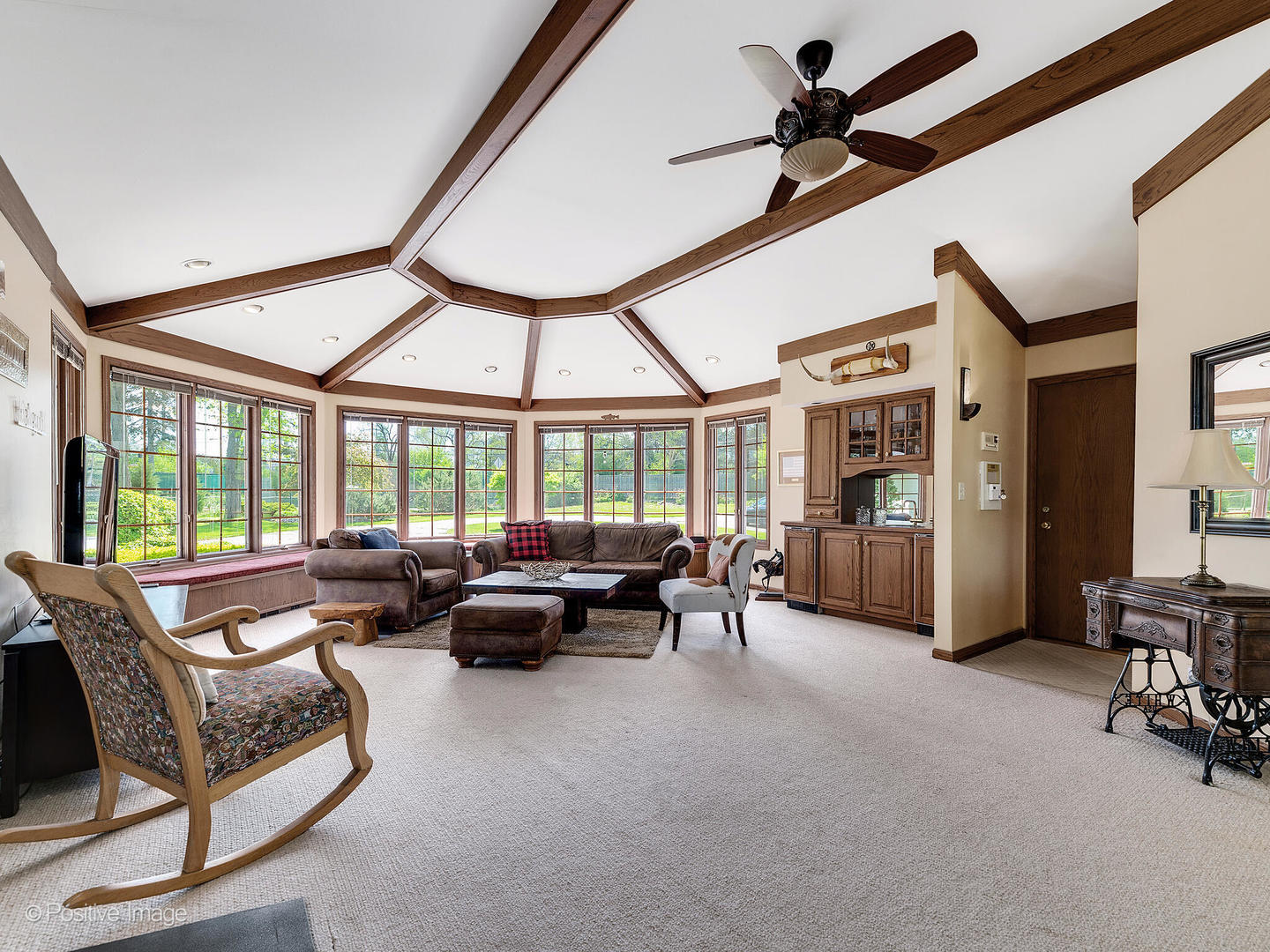 6401 South County Line Road Burr Ridge, IL 60527 - Photo 11 of 57 a living room with furniture and a large window