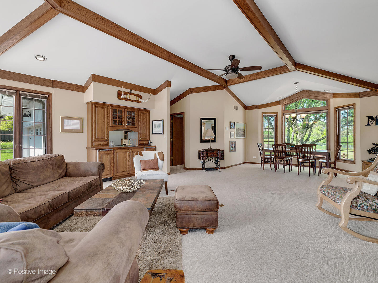 6401 South County Line Road Burr Ridge, IL 60527 - Photo 12 of 57 a living room with furniture and a chandelier