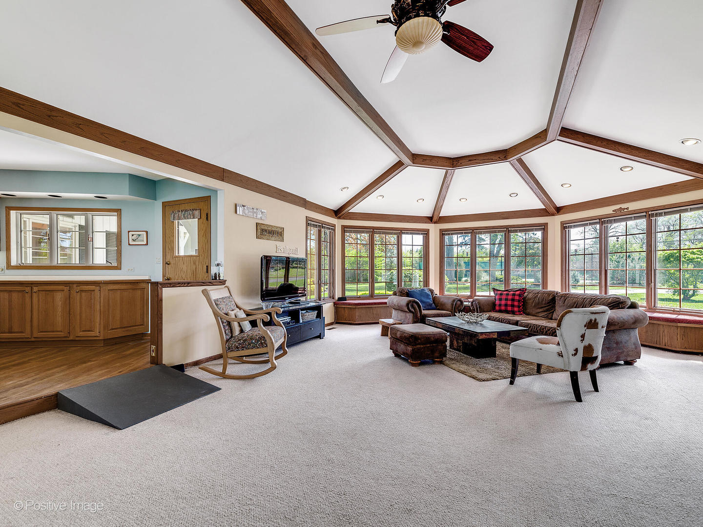6401 South County Line Road Burr Ridge, IL 60527 - Photo 14 of 57 a living room with furniture and a large window