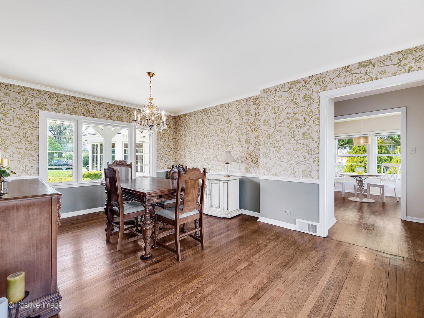 6401 South County Line Road Burr Ridge, IL 60527 - Photo 15 of 57 a view of a dining room with furniture window and wooden floor