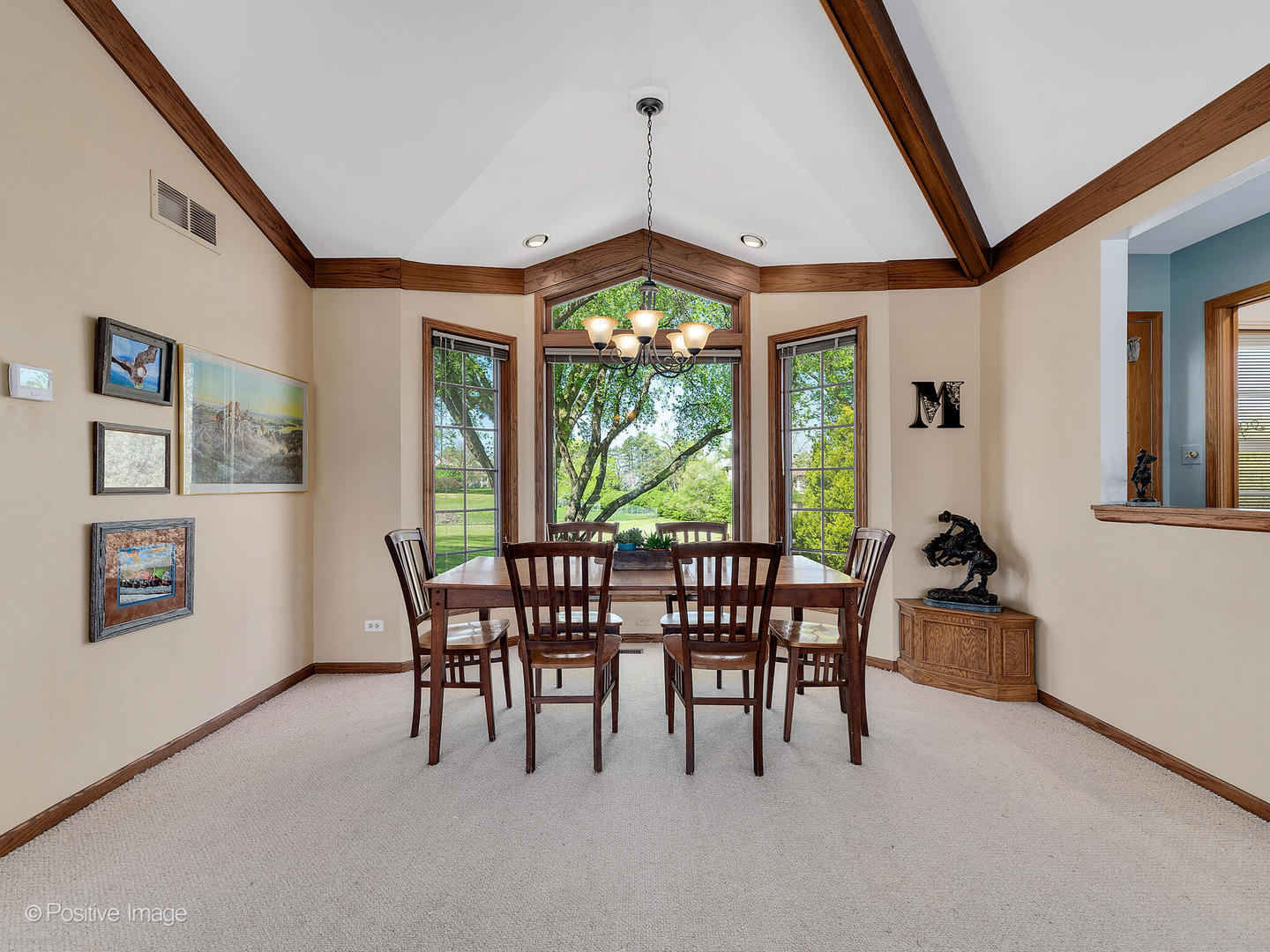 6401 South County Line Road Burr Ridge, IL 60527 - Photo 16 of 57 a dining room with furniture window chandeliers