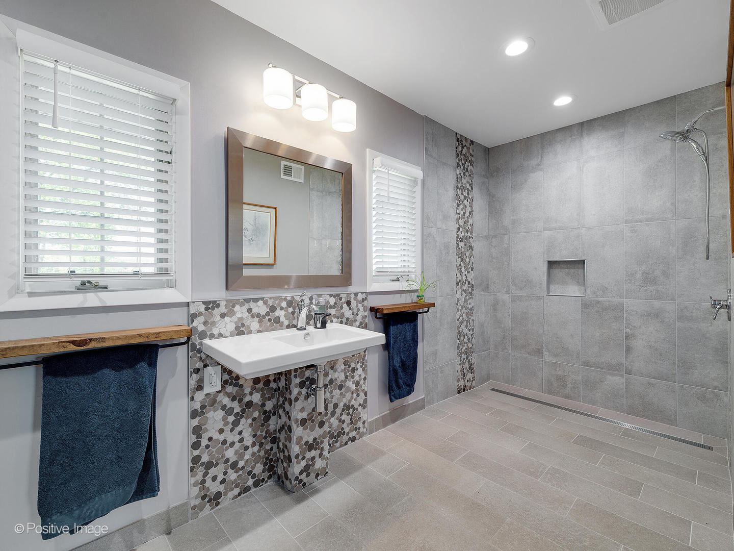 6401 South County Line Road Burr Ridge, IL 60527 - Photo 31 of 57 a bathroom with a sink and a mirror
