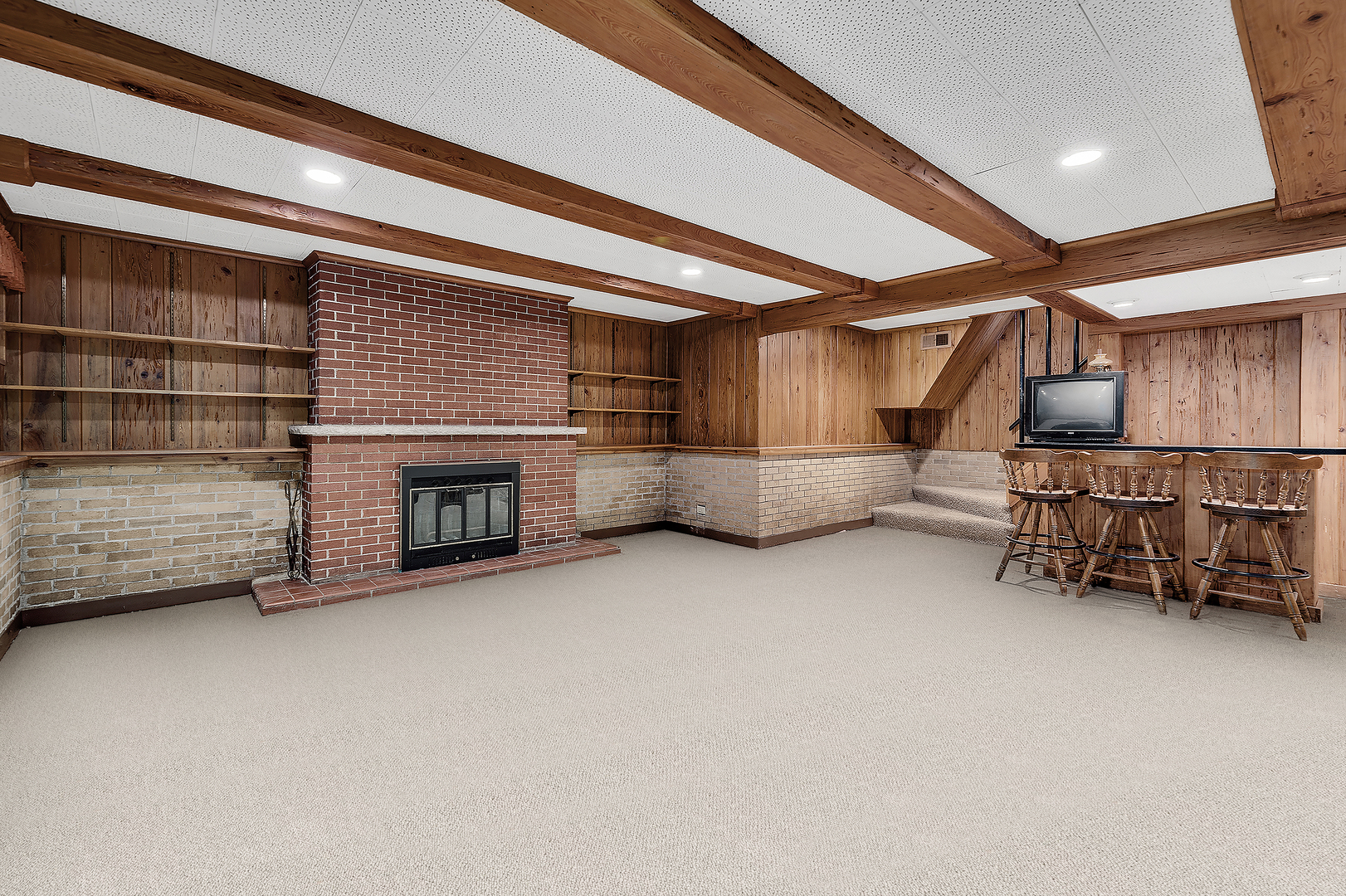 6401 South County Line Road Burr Ridge, IL 60527 - Photo 36 of 57 a living room with furniture and a fireplace