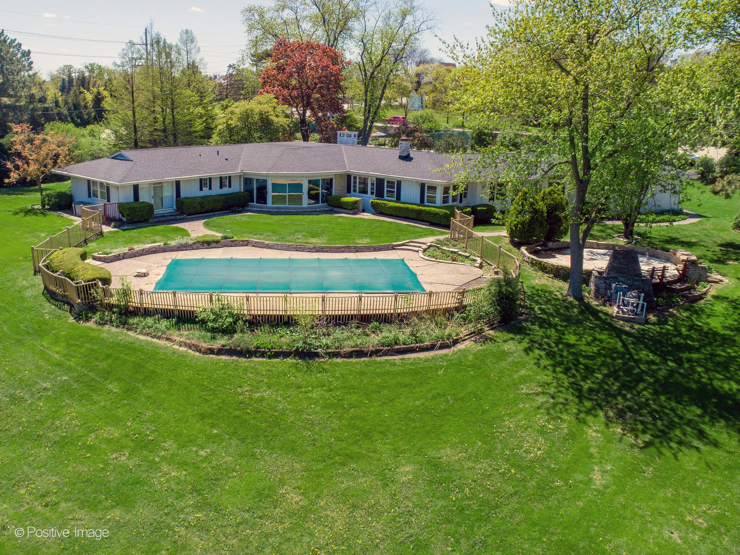 6401 South County Line Road Burr Ridge, IL 60527 - Photo 45 of 57 a view of swimming pool with outdoor seating and yard
