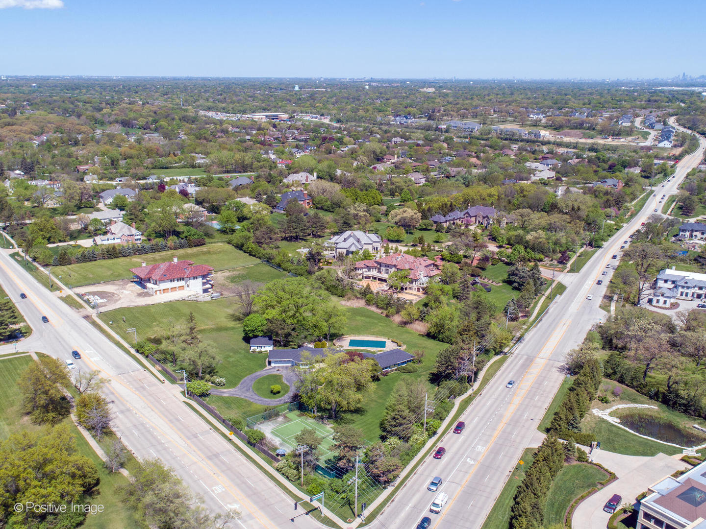 6401 South County Line Road Burr Ridge, IL 60527 - Photo 48 of 57 an aerial view of residential houses with outdoor space
