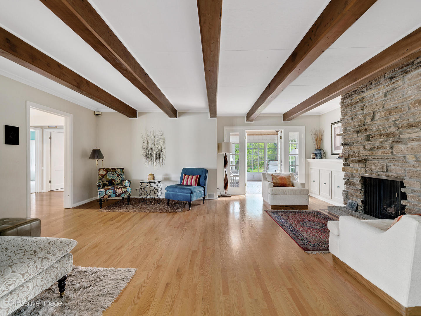 6401 South County Line Road Burr Ridge, IL 60527 - Photo 6 of 57 a living room with furniture and a fireplace