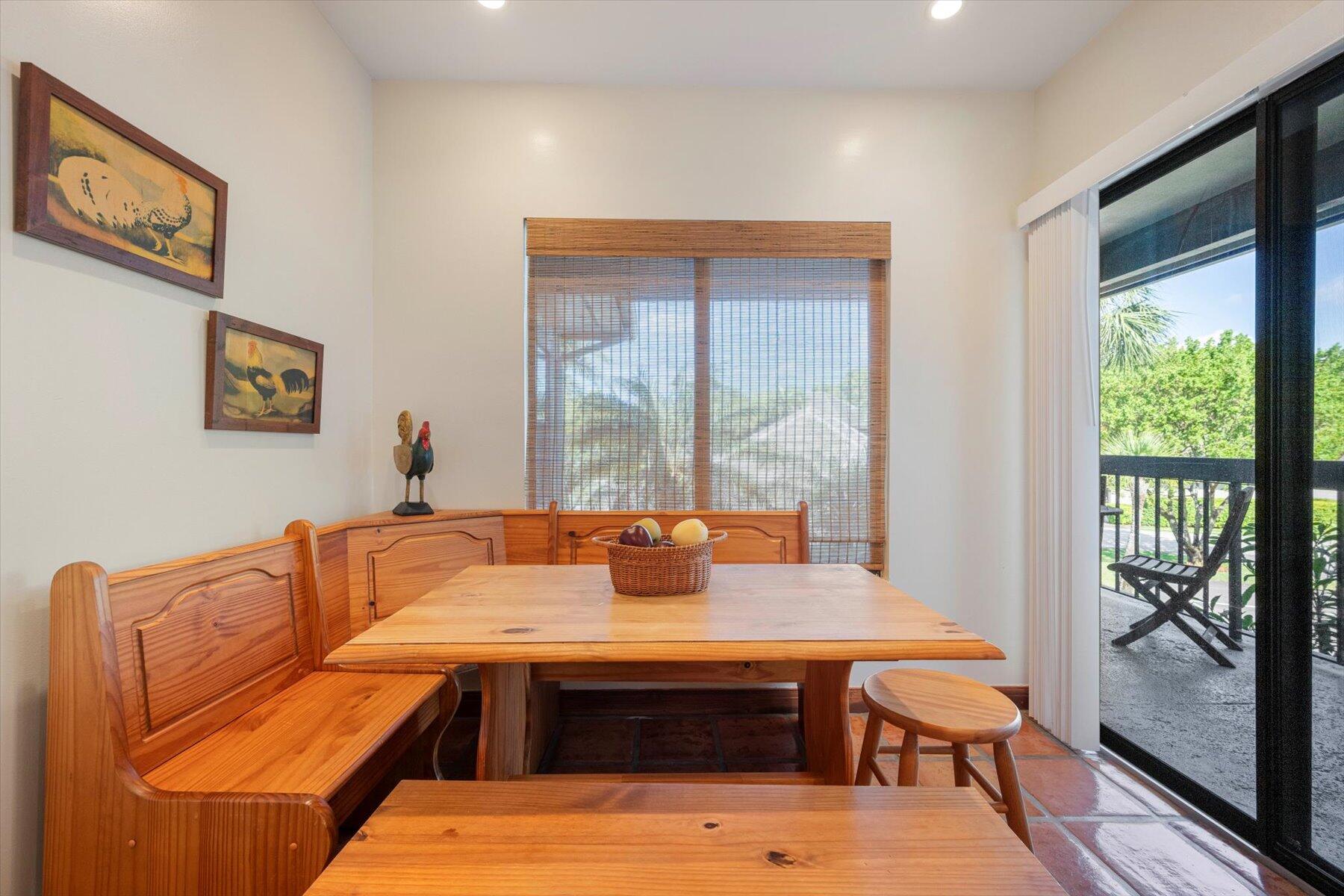 13244 Polo Club Road, Unit C207 Wellington, FL 33414 - Photo 8 of 31 a view of a dining room with furniture window and outside view