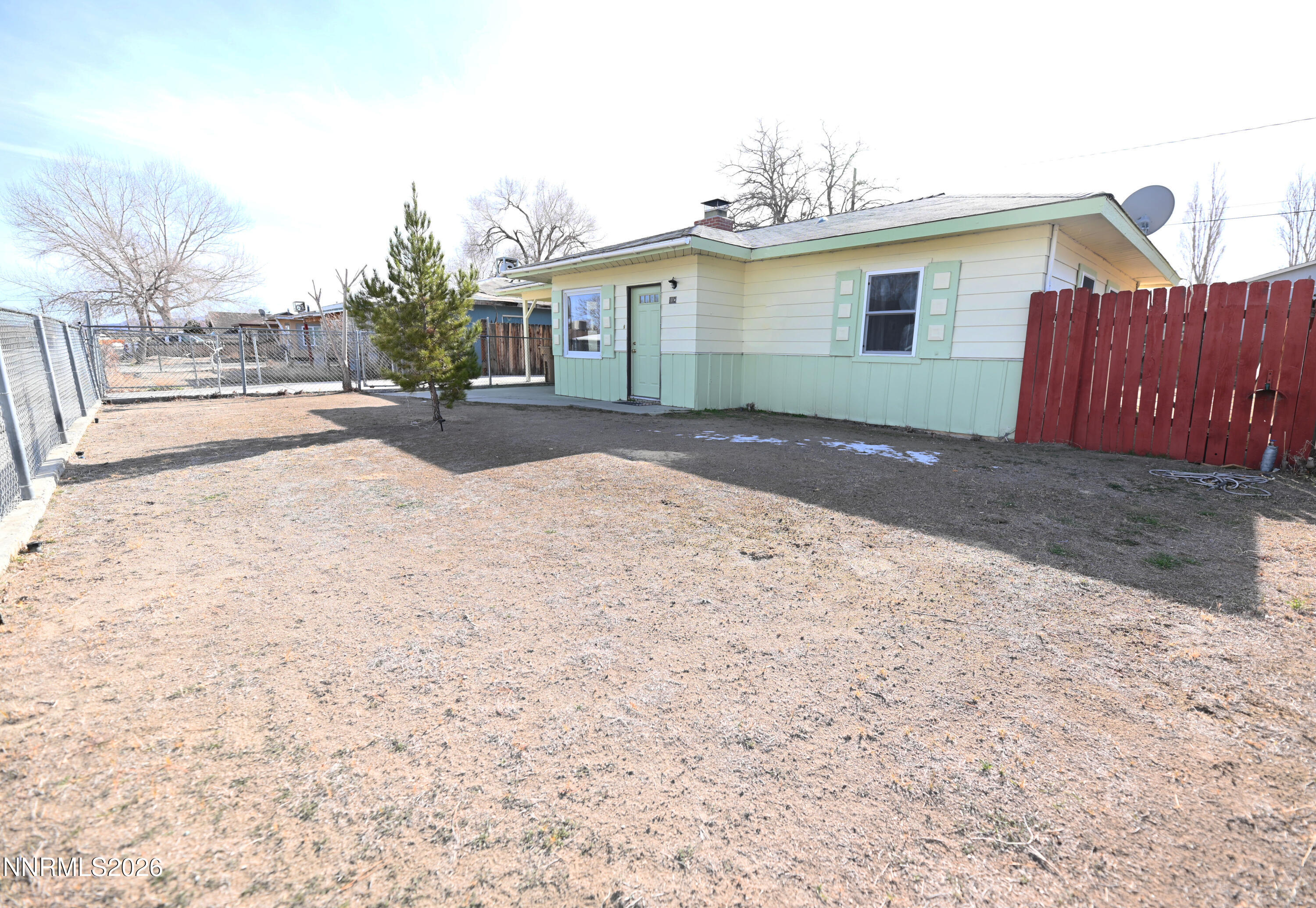110 Harrison Street Hawthorne, NV 89415 - Photo 28 of 30 a view of a house with a patio