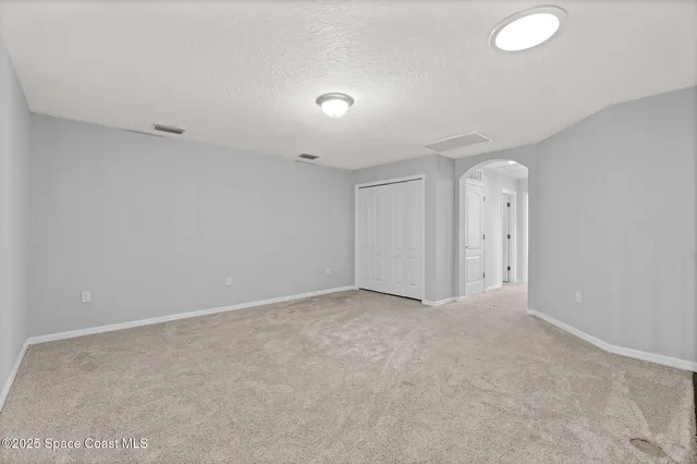 an empty room with an entryway