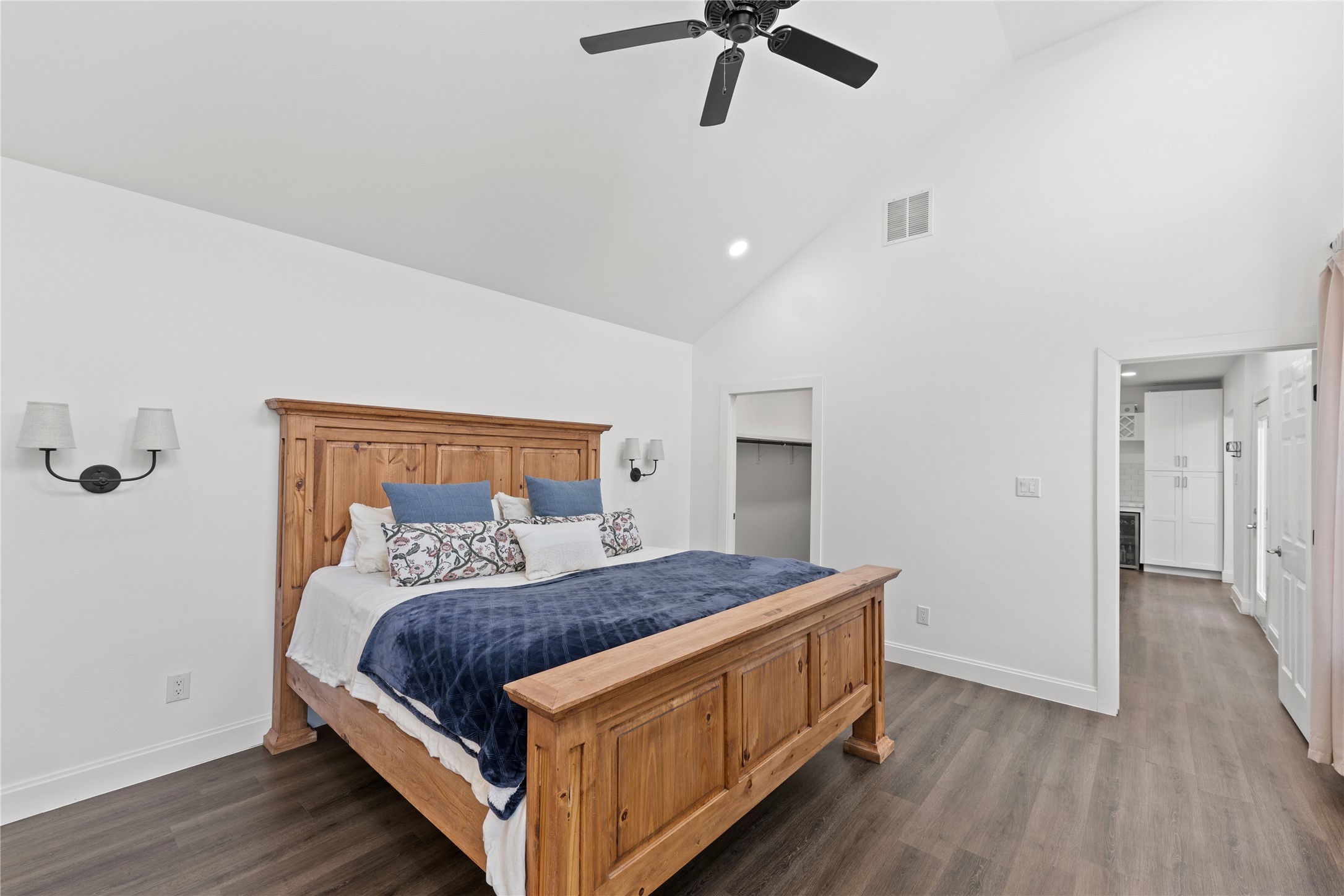 3211 Cochran Street Houston, TX 77009 - Photo 13 of 32 a bedroom with a bed and ceiling fan