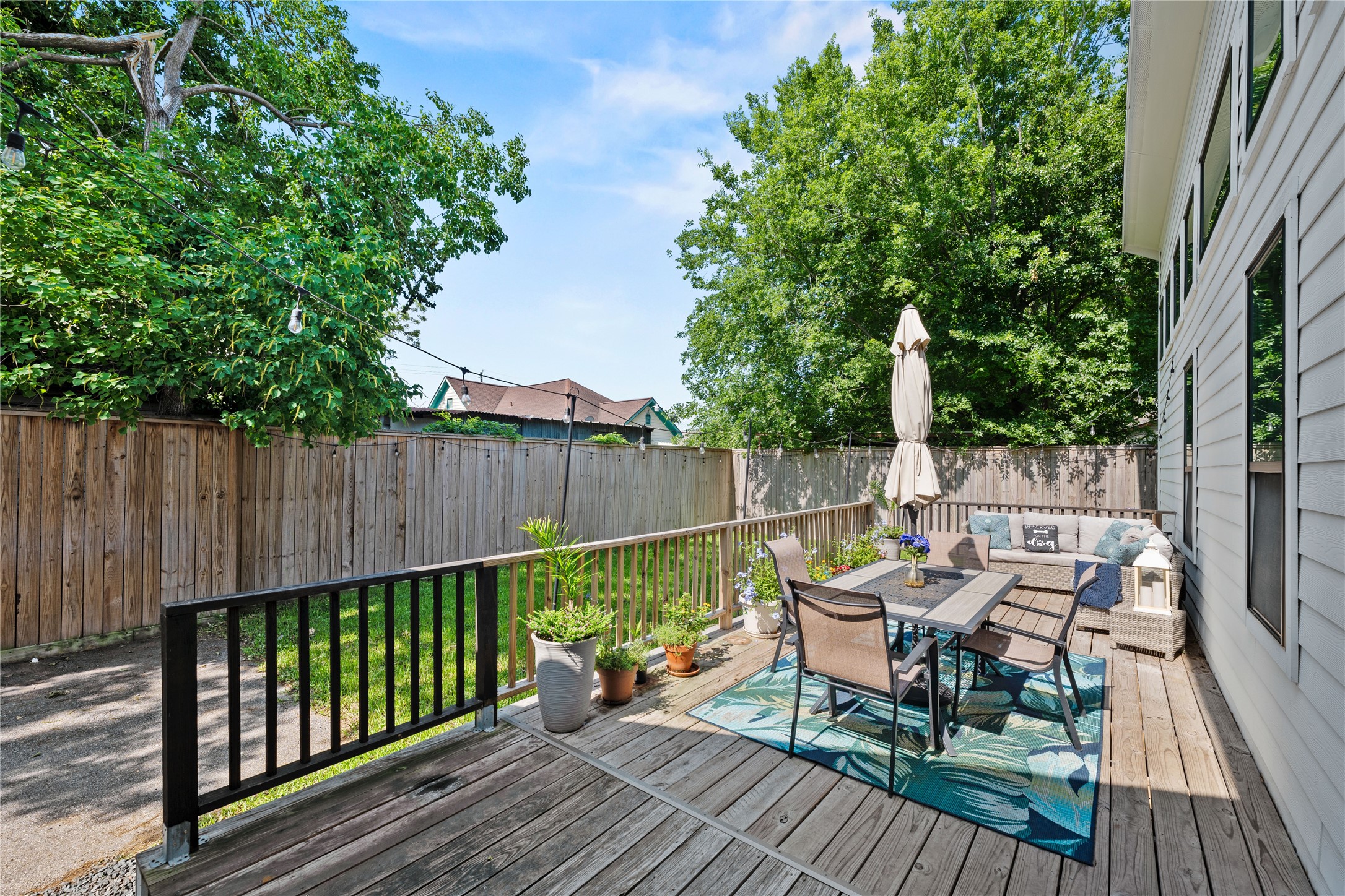3211 Cochran Street Houston, TX 77009 - Photo 23 of 32 a view of a wooden deck with furniture