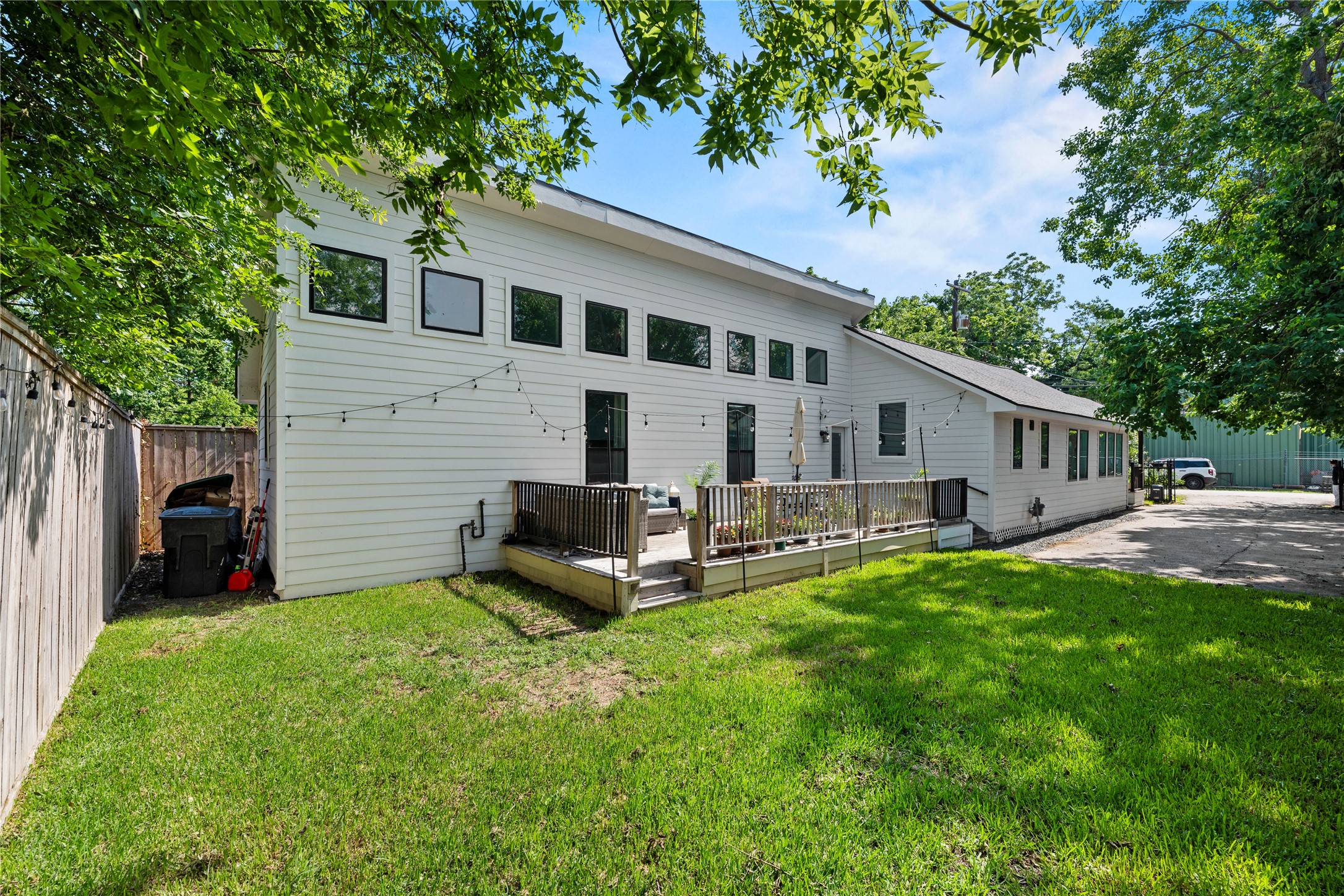 3211 Cochran Street Houston, TX 77009 - Photo 26 of 32 a front view of house with a garden and patio