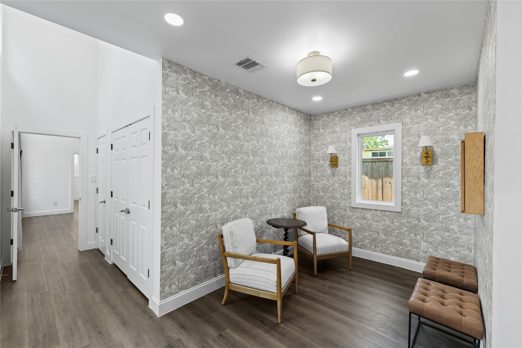 3211 Cochran Street Houston, TX 77009 - Photo 9 of 32 a living room with furniture and wooden floor