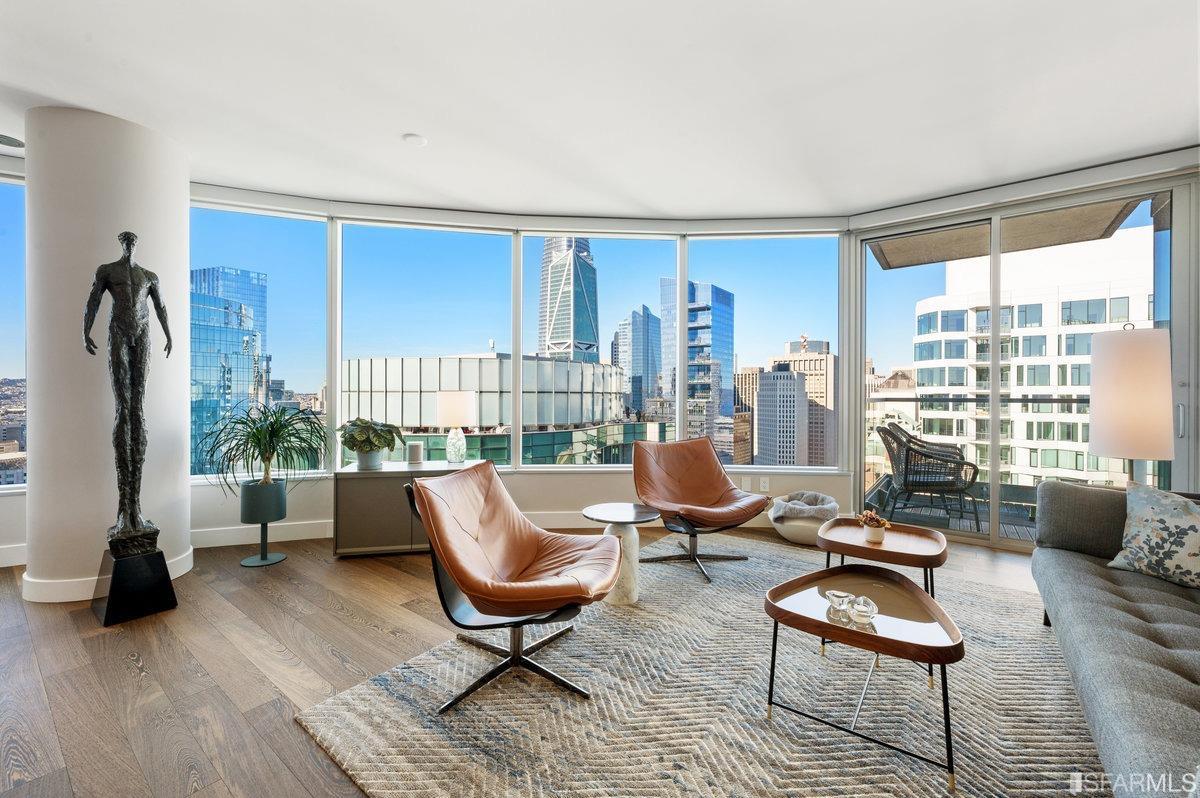 338 Spear Street, Unit 39E San Francisco, CA 94105 - Photo 15 of 97 a living room with furniture and a large window