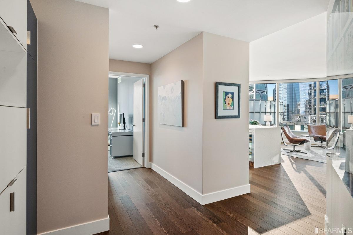 338 Spear Street, Unit 39E San Francisco, CA 94105 - Photo 25 of 97 a view of a living room with furniture and wooden floor