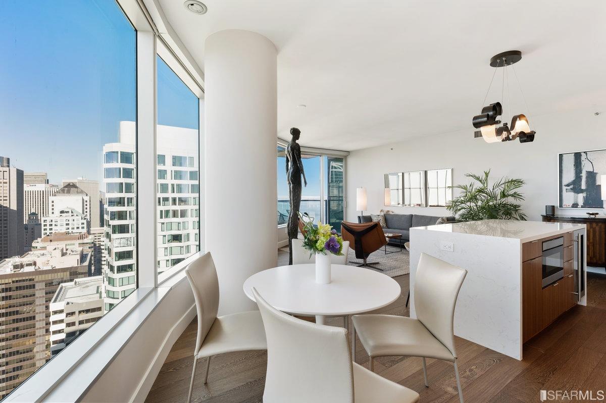 338 Spear Street, Unit 39E San Francisco, CA 94105 - Photo 26 of 97 a view of a dining room with furniture window and wooden floor