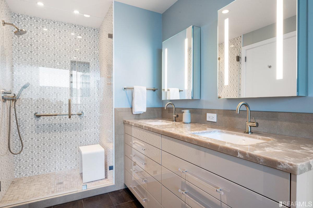 338 Spear Street, Unit 39E San Francisco, CA 94105 - Photo 37 of 97 a bathroom with a granite countertop sink mirror and double