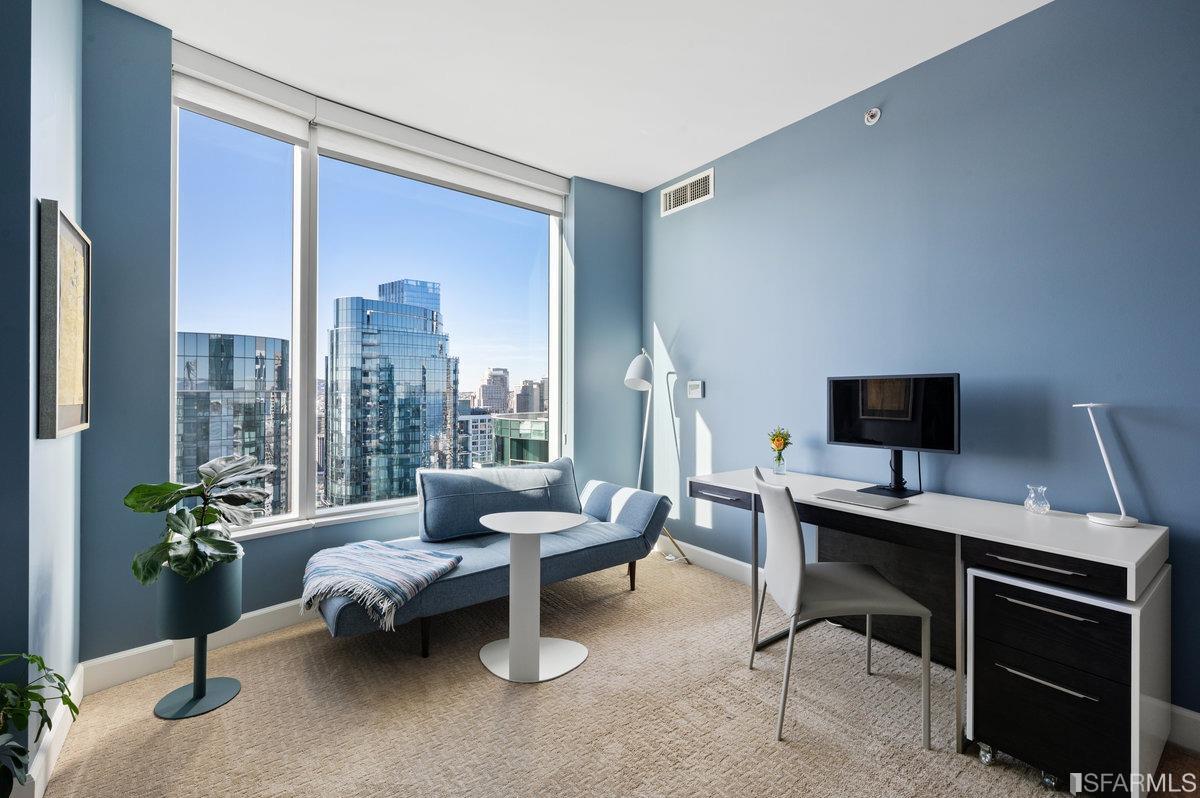 338 Spear Street, Unit 39E San Francisco, CA 94105 - Photo 39 of 97 a work room with furniture and a potted plant