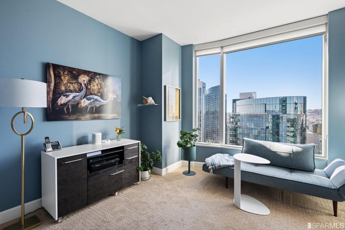 338 Spear Street, Unit 39E San Francisco, CA 94105 - Photo 40 of 97 a living room with furniture a lamp and a large window