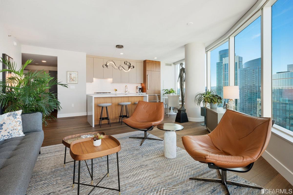 338 Spear Street, Unit 39E San Francisco, CA 94105 - Photo 4 of 97 a living room with furniture and a large window