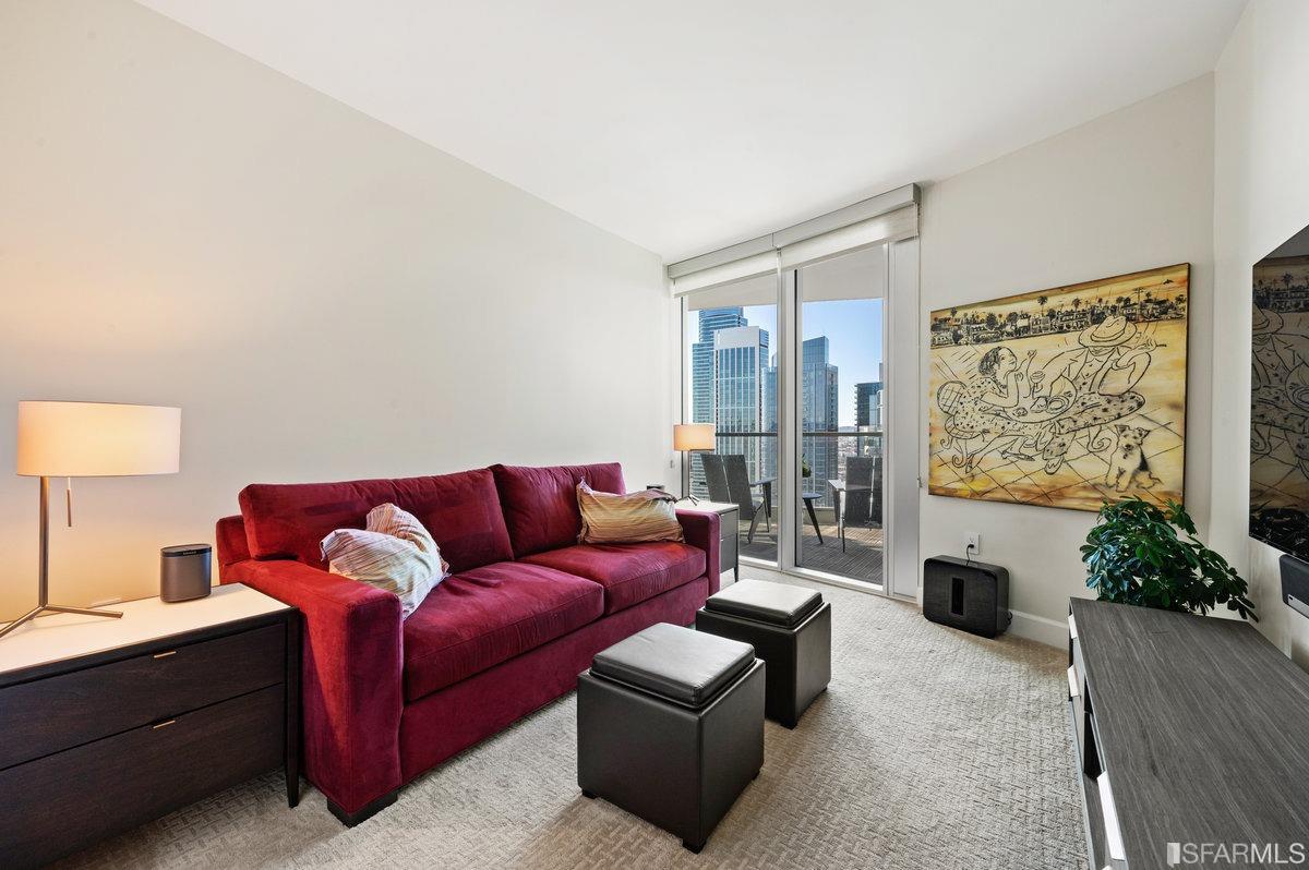 338 Spear Street, Unit 39E San Francisco, CA 94105 - Photo 41 of 97 a living room with furniture and a flat screen tv