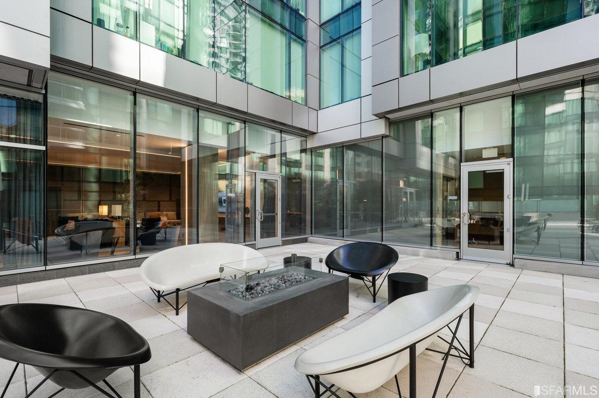 338 Spear Street, Unit 39E San Francisco, CA 94105 - Photo 51 of 97 a patio with a table and chairs