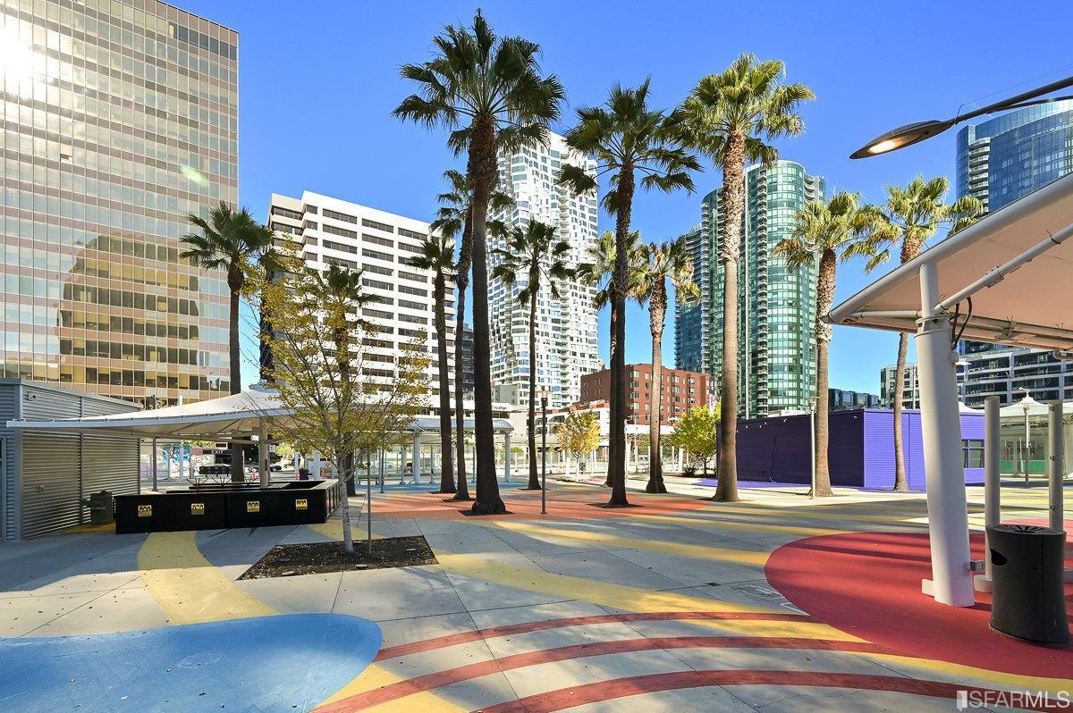 338 Spear Street, Unit 39E San Francisco, CA 94105 - Photo 56 of 97 a view of a building with a palm tree