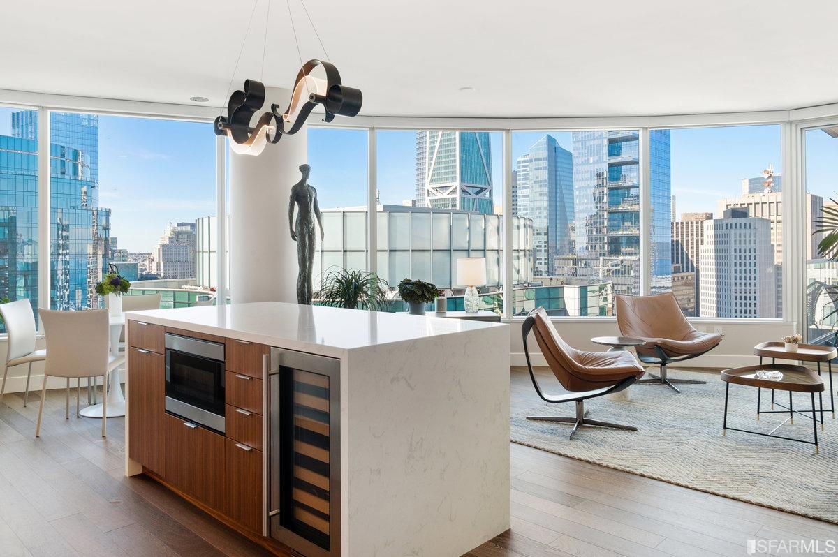 338 Spear Street, Unit 39E San Francisco, CA 94105 - Photo 6 of 97 a living room with furniture a window and a table