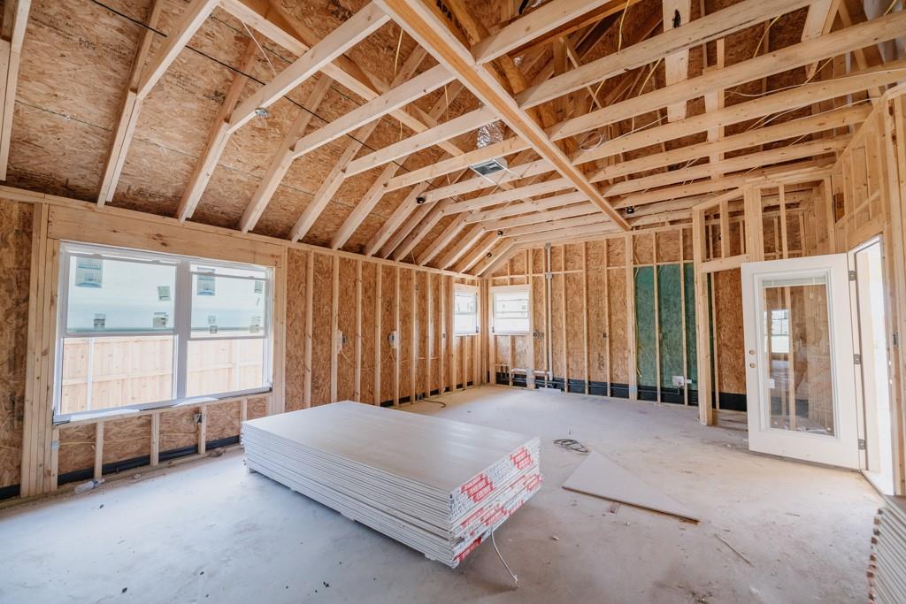 1313 Red Rock Road Lorena, TX 76655 - Photo 4 of 13 a spacious bedroom with a bed and a large window